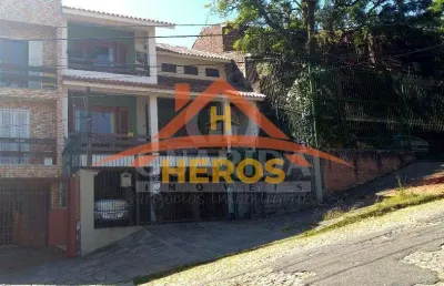 Casa com 3 quartos à venda na rua doutor dias da cruz, 83, medianeira, porto alegre por r$ 1.600.000