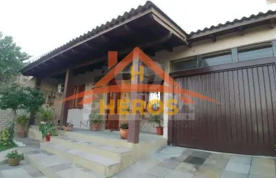Casa com 3 quartos à venda na rua francisco mattos terres, 80, hípica, porto alegre por r$ 520.000