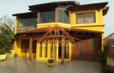 Casa com 4 quartos à venda na rua marquês do maricá, 505, vila nova, porto alegre por r$ 795.000
