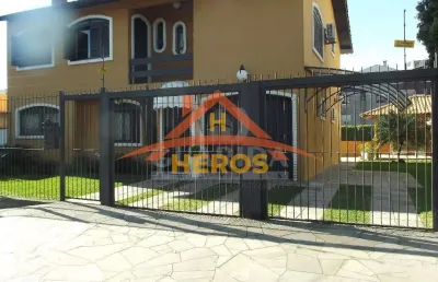 Casa com 3 quartos à venda na rua inhanduí, 340, cristal, porto alegre por r$ 1.378.000