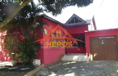 Casa com 4 quartos à venda na avenida flamengo, 413, ipanema, porto alegre por r$ 980.000