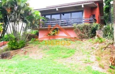 Casa com 5 quartos à venda na rua alcebíades antônio dos santos, 260, nonoai, porto alegre por r$ 963.000