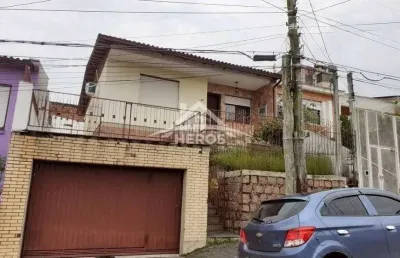 Casa com 3 quartos à venda na rua doutor lucidoro brito, 135, medianeira, porto alegre por r$ 396.000