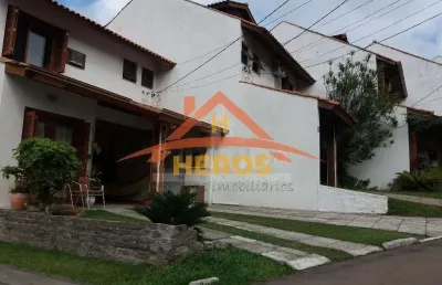 Casa em condomínio fechado com 3 quartos à venda na avenida eduardo prado, 695, cavalhada, porto alegre por r$ 750.000