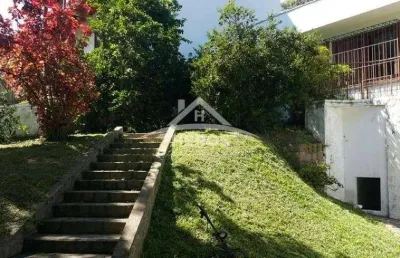 Casa com 3 quartos à venda na rua padre joão batista reus, 267, vila conceição, porto alegre por r$ 940.000
