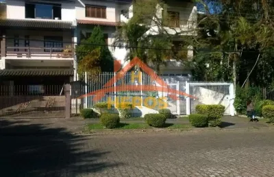 Casa com 4 quartos à venda na rua imeram teixeira cabeleira, 79, aberta dos morros, porto alegre por r$ 950.000