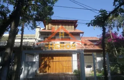 Casa com 3 quartos à venda na rua érico silveira peixoto, 85, ipanema, porto alegre por r$ 960.000