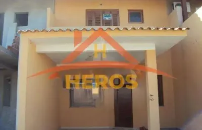 Casa com 3 quartos à venda na rua alexio fagherazzi, 67, hípica, porto alegre por r$ 395.000
