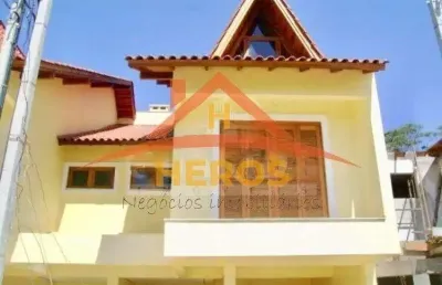 Casa em condomínio fechado com 3 quartos à venda na rua pau brasil, 774, hípica, porto alegre por r$ 425.000