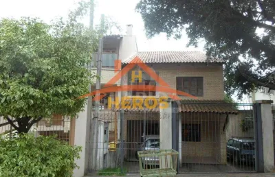 Casa com 3 quartos à venda na rua imeram teixeira cabeleira, 64, ipanema, porto alegre por r$ 600.000
