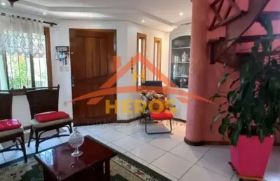 Casa com 3 quartos à venda na rua ocimar antonio pereira, 79, hípica, porto alegre por r$ 498.000