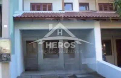 Casa em condomínio fechado com 3 quartos à venda na avenida altos do santa rita, 229, hípica, porto alegre por r$ 480.000
