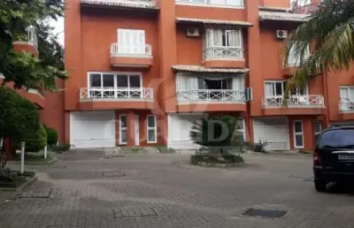 Casa em condomínio fechado com 3 quartos à venda na avenida guaíba, 4400, vila assunção, porto alegre por r$ 1.248.000