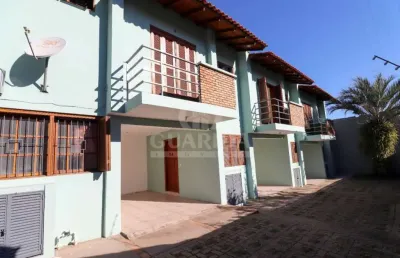 Casa em condomínio fechado com 3 quartos à venda na rua são sebastião do cai, 119, camaquã, porto alegre por r$ 379.000