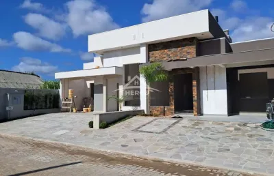 Casa em condomínio fechado com 3 quartos à venda na avenida juca batista, 5505, hípica, porto alegre por r$ 699.000