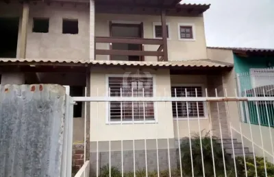 Casa com 3 quartos à venda na rua itacyr rossi, 10, guarujá, porto alegre por r$ 490.000