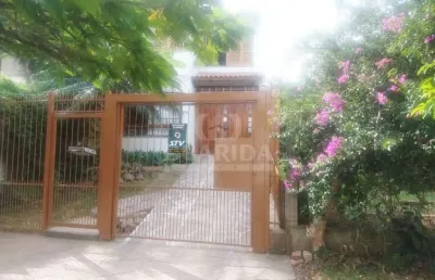 Casa com 3 quartos à venda na rua josué guimarães, 258, espírito santo, porto alegre por r$ 595.000