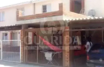 Casa em condomínio fechado com 2 quartos à venda na rua atílio supertti, 580, vila nova, porto alegre por r$ 200.000