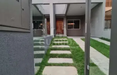 Casa com 3 quartos à venda na rua itacyr rossi, 31, guarujá, porto alegre por r$ 525.000