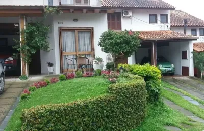 Casa em condomínio fechado com 3 quartos à venda na avenida eduardo prado, 695, cavalhada, porto alegre por r$ 750.000