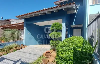 Casa com 3 quartos à venda na rua professor elpídio ferreira paes, 57, ipanema, porto alegre por r$ 690.000
