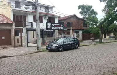 Casa com 3 quartos à venda na rua márcio dias, 360, nonoai, porto alegre por r$ 900.000