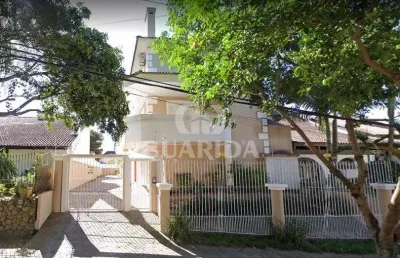Casa em condomínio fechado com 3 quartos à venda na rua doutor guilherme schultz filho, 80, jardim isabel, porto alegre por r$ 850.000