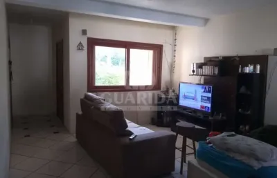 Casa em condomínio fechado com 3 quartos à venda na rua amapá, 786, vila nova, porto alegre por r$ 297.000