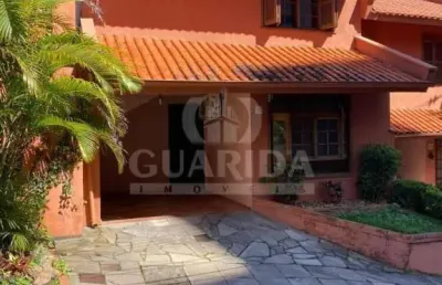 Casa em condomínio fechado com 3 quartos à venda na rua dom vital, 212, glória, porto alegre por r$ 525.000