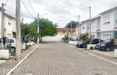 Casa em condomínio fechado com 3 quartos à venda na avenida edgar pires de castro, 2520, hípica, porto alegre por r$ 349.000