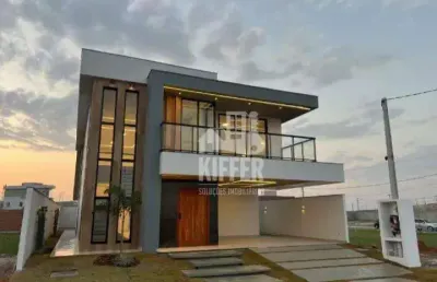 Casa nova com vista para a lagoa, 4 quartos, área gourmet e energia solar – condomínio com clube