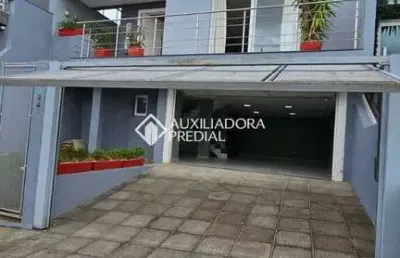 Casa em condomínio fechado com 4 quartos para alugar na rua walter porto filho, 240, mário quintana, porto alegre, 284 m2 por r$ 6.300