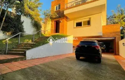 Casa em condomínio fechado com 4 quartos para alugar na rua rádio e travessa gaúcha, 59, santa tereza, porto alegre, 339 m2 por r$ 11.000