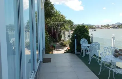 Casa com 4 quartos à venda na rodovia haroldo soares glavan, 4609, cacupé, florianópolis, 274 m2 por r$ 6.500.000