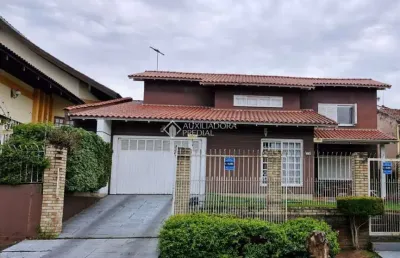 Casa com 4 quartos à venda na rua waldemar guido vicentini, 364, dom feliciano, gravataí, 266 m2 por r$ 1.050.000