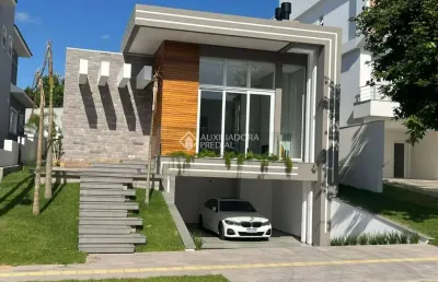 Casa com 3 quartos à venda na urânio, 408, são vicente, gravataí, 220 m2 por r$ 2.190.000