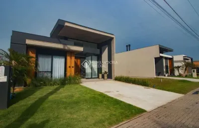 Casa com 4 quartos à venda na rua rio novo, 001, centro, xangri-lá, 169 m2 por r$ 1.870.000