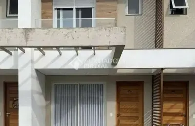 Casa em condomínio fechado com 2 quartos à venda na rua roberto carlos wagner, 800, zona nova, capão da canoa, 114 m2 por r$ 890.000
