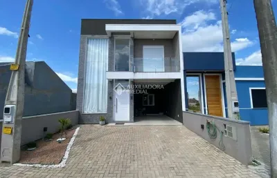 Casa com 3 quartos à venda na alcides gomes, 10, parque dos anjos, gravataí, 128 m2 por r$ 630.000