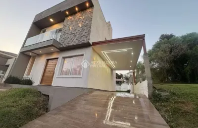 Casa em condomínio fechado com 3 quartos à venda na avenida luigi lucchese, 440, loteamento jardim timbaúva, gravataí, 150 m2 por r$ 899.000