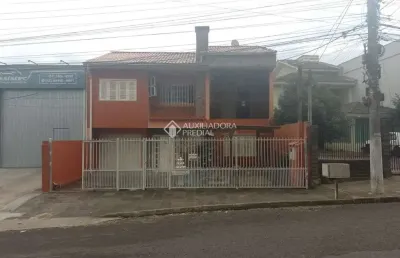 Casa em condomínio fechado com 4 quartos à venda na rua veranópolis, 74, vera cruz, gravataí, 250 m2 por r$ 850.000