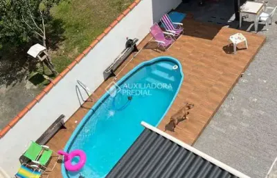 Casa com 3 quartos à venda na henrique nicolau peixer, 95, enseada de brito, palhoça, 200 m2 por r$ 1.190.000