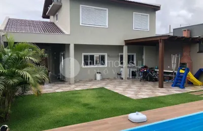 Sobrado no litoral , 4 quartos com ar condicionado quente frio, ampla sala, 2 wc