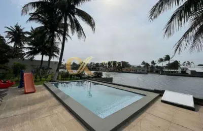 Casa contemporânea com 1500 m² de terreno em canal navegável em cabo frio - rj.