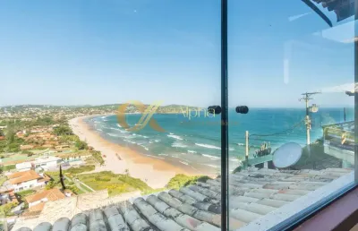 Casa à venda com 4 quartos (3 suítes) com vista ao mar cinematográfica