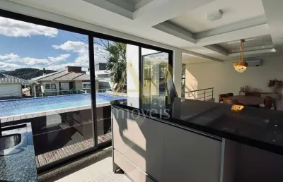 Casa alto padrão semimobiliada à venda com 3 suítes e piscina/ pedra branca