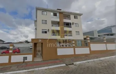 Apartamento à venda em forquinhas com 2 dorm e sacada com churrasqueira