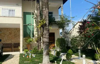 Luxuosa casa de condomínio à venda em bertioga-sp: 5 quartos, 5 suítes, 3 salas, 4 vagas, 320m² no centro.