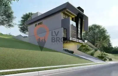 Magnífica casa de alto padrão em condomínio de luxo em arujá-sp, com 4 suítes - em construção - entrega março 26.