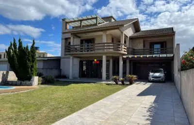 Casa de 04 suítes, próximo ao mar na zona nova de tramandaí!